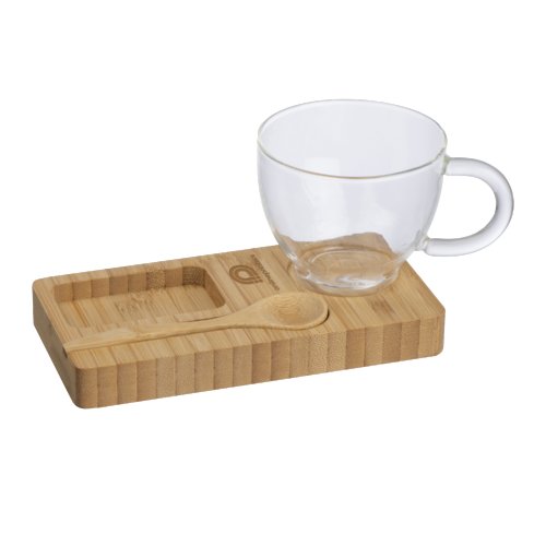 Planche de service en bois avec tasse et cuillre assorties.