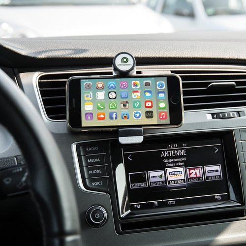 Support de tlphone noir en plastique pour fixation dans la voiture.