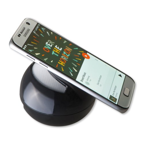 Haut-parleur Bluetooth noir de forme ronde.