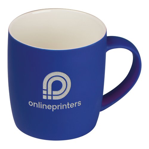 Mug en cramique bleu avec une forme arrondie et une poigne.