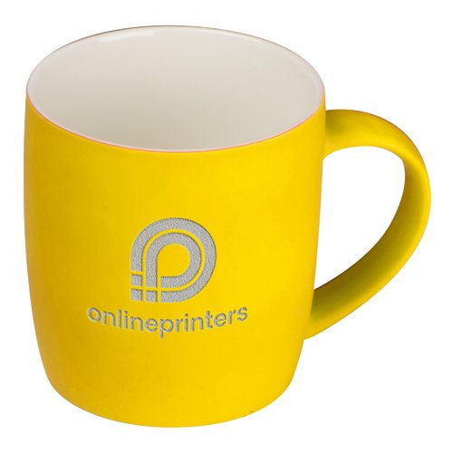 Tasse en cramique jaune avec anse.