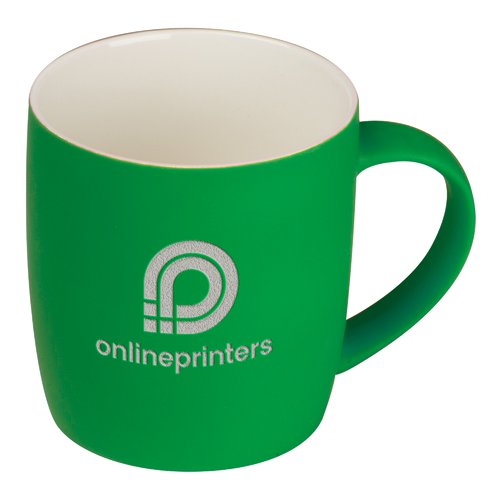 Tasse en cramique verte avec bords arrondis et anse.
