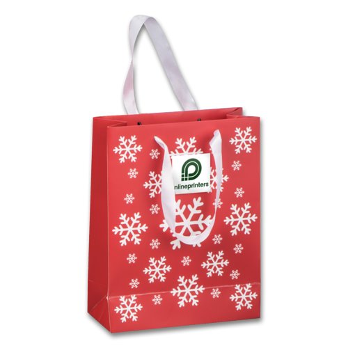 Sac en papier rouge avec anses.