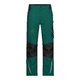 Pantalon de travail vert fonc/noir en polyester-coton avec poches.